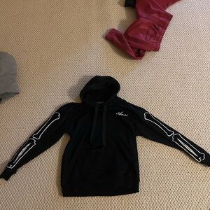 AMIRI Jet Black Hoodie with Subtle Logo